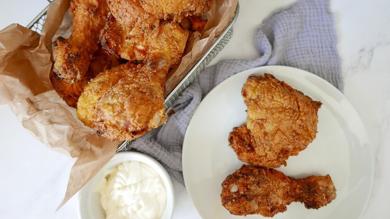 chicken legs on white plate