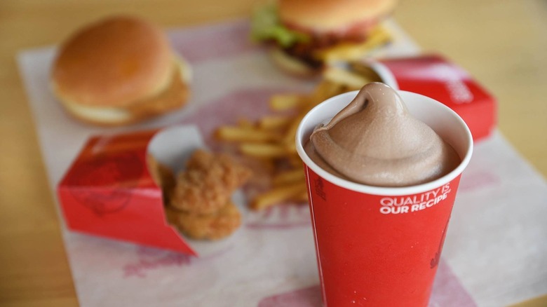 Wendy's Frosty in front of burger and fries