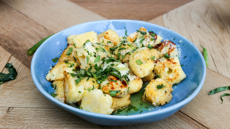 Gnocchi in blue bowl