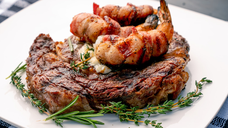 Steak topped with shrimp