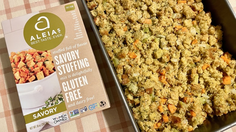 Aleia's Savory Stuffing Mix Box and prepared stuffing in a pan