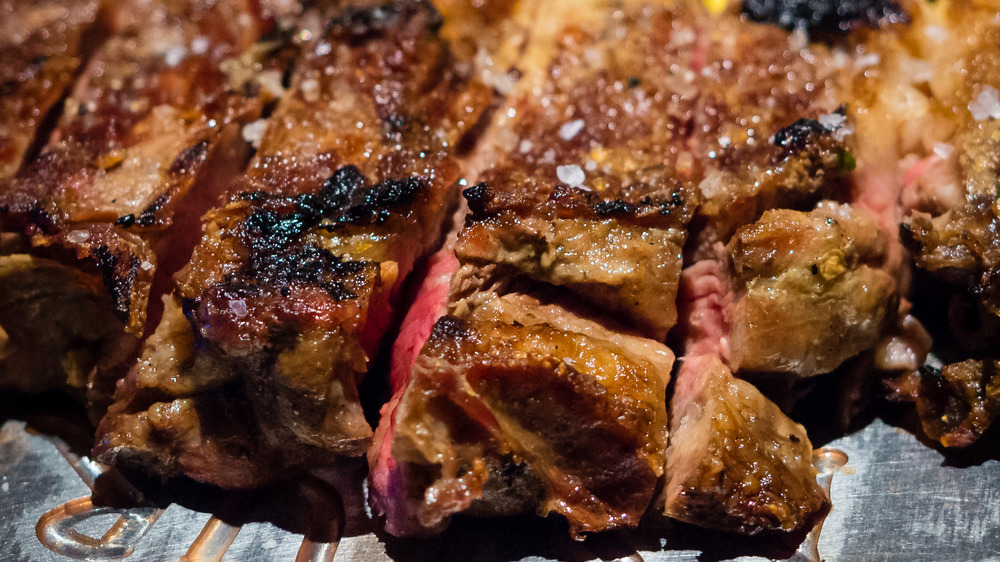 Ribeye steak cut into strips