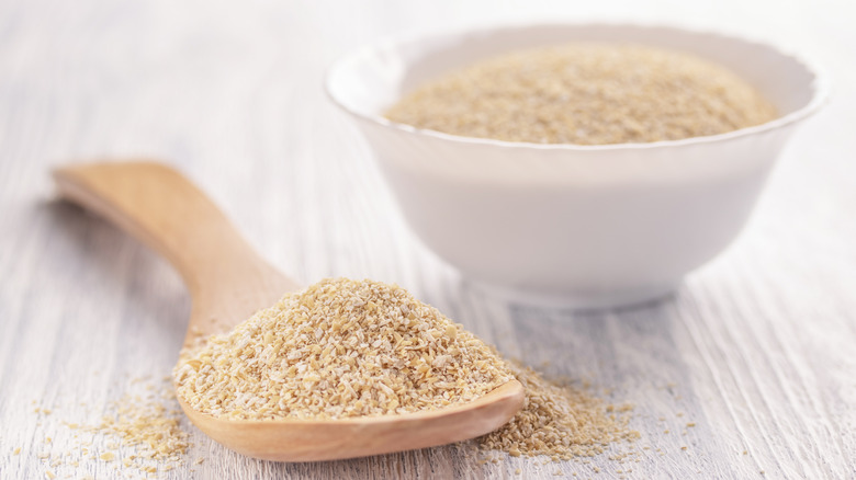 oat bran in a bowl with spoon