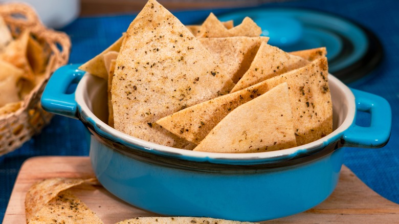 Corn chips in blue ceramic bowl