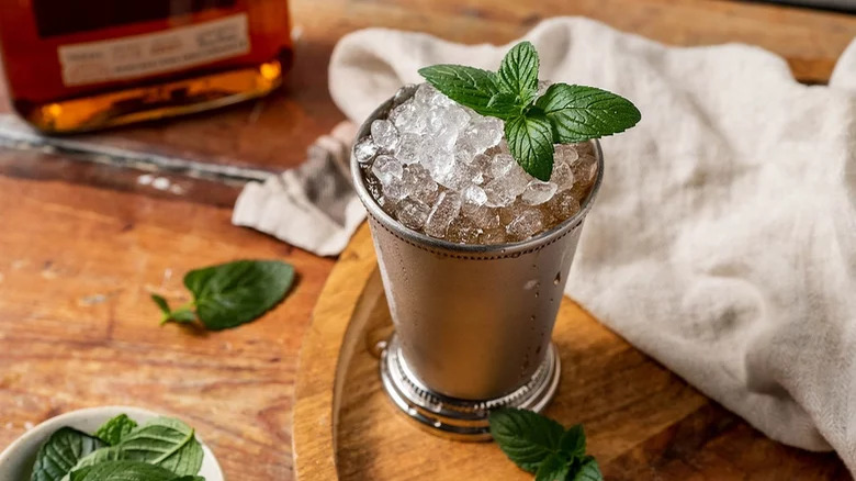 glass of mint julep with spearmint garnish