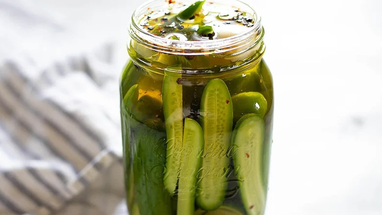 homemade pickles in unsealed jar