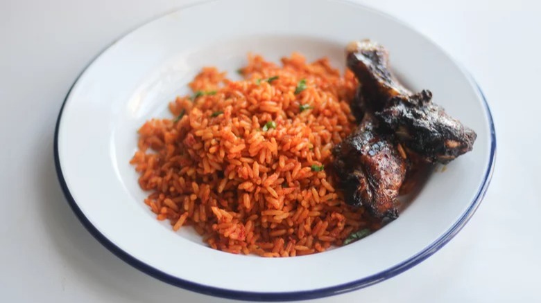 african jollof rice with protein on side