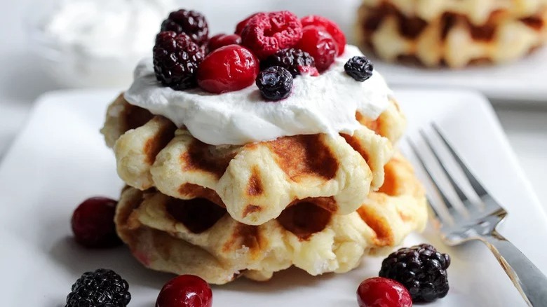 waffles with cream and berries