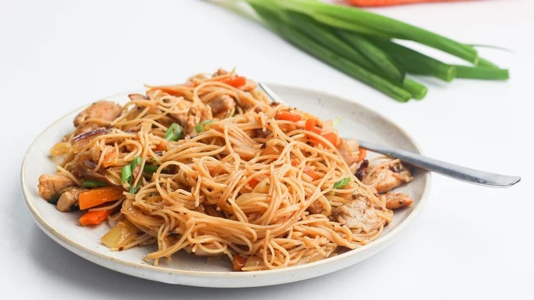 plate of pancit with fork