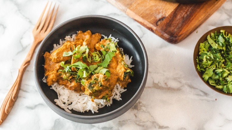 butter chicken with garnish