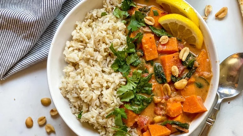 peanut stew with spoon