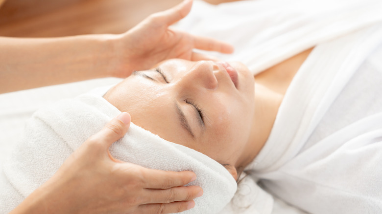 woman relaxing with eyes closed