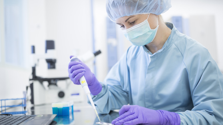 scientist with syringe