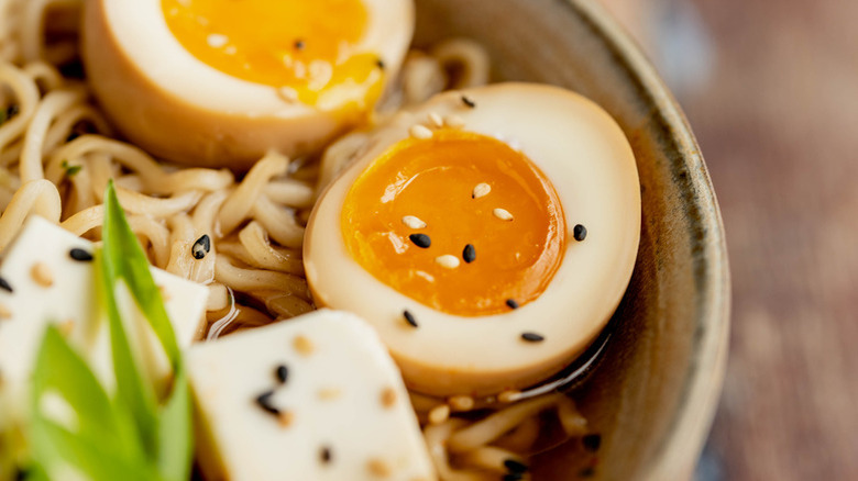 soft-boiled eggs with noodles