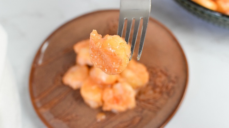 cooked shrimp on a fork