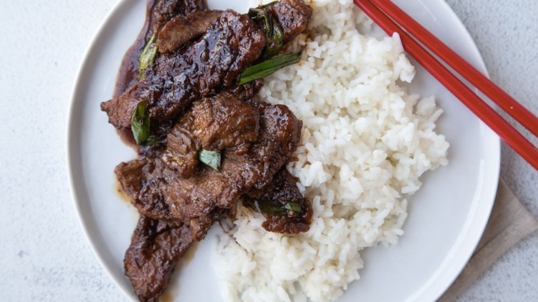 beef with rice on plate