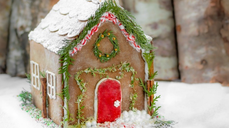 gingerbread house with pine needles