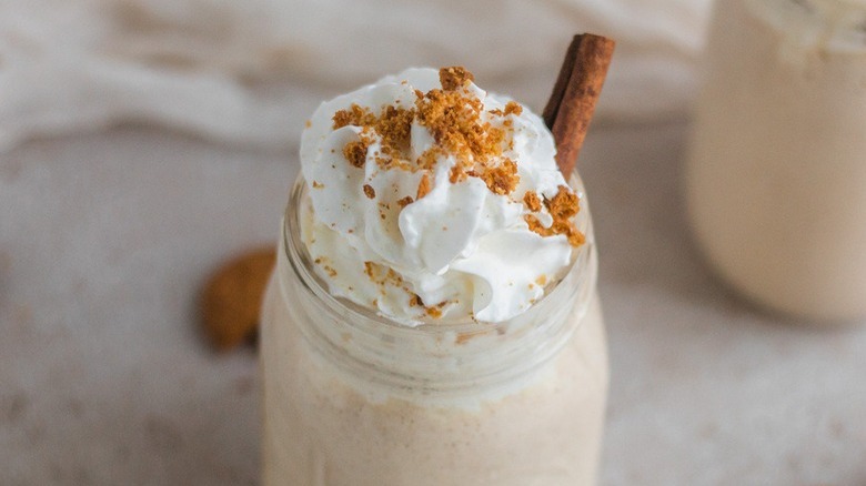 milkshake with whipped cream, gingersnaps 