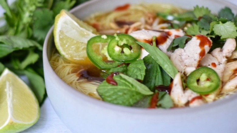 bowl of pho with jalapeños