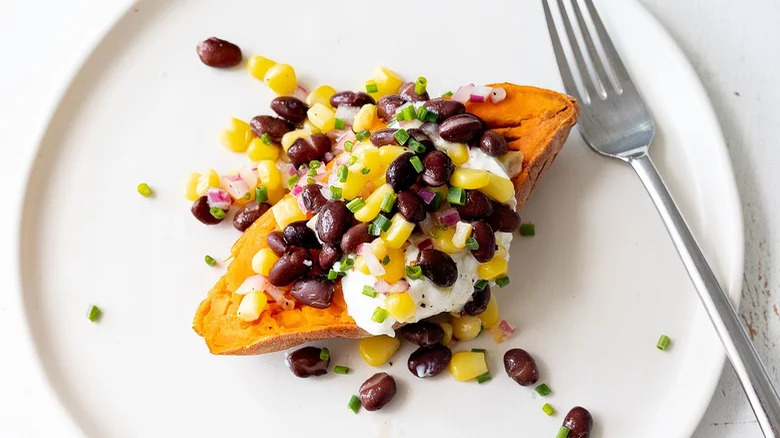 loaded sweet potato with fork