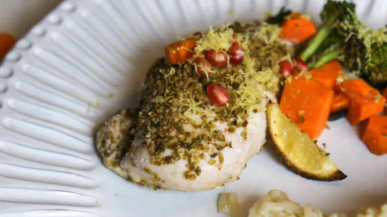 chicken breast with vegetables and pomegrante seeds