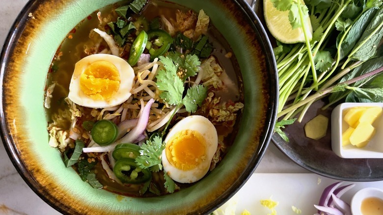 fancy bowl of ramen with hard boiled eggs