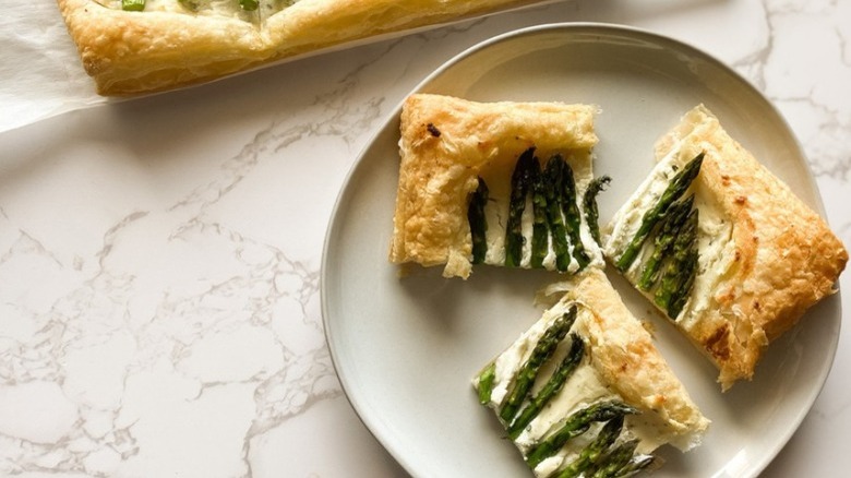 plate of sliced asparagus tart