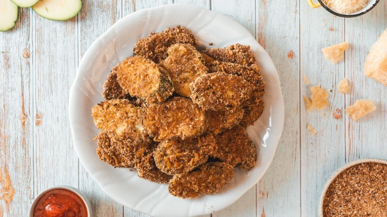 fried zucchini on wooden table