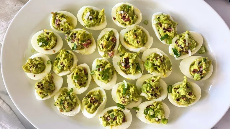 plate of guacamole deviled eggs