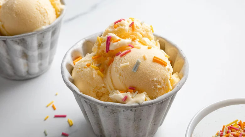Bowl of vanilla ice cream with sprinkles