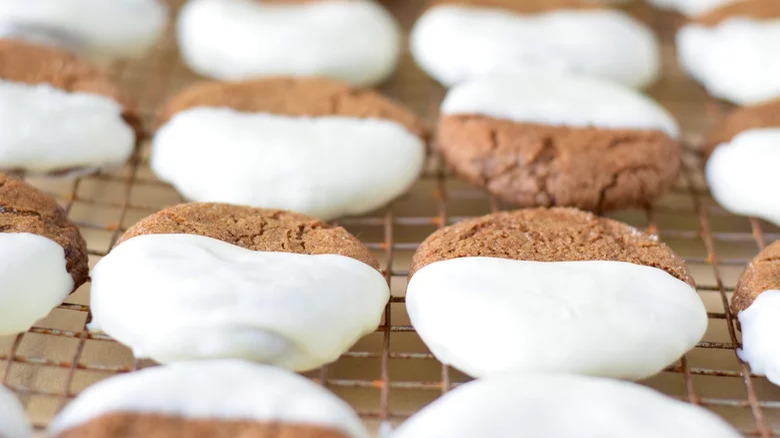 A rack of white chocolate-dipped cookies