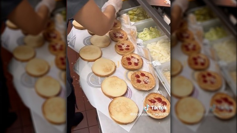 Multiple Mcdonald's hamburgers being assembled