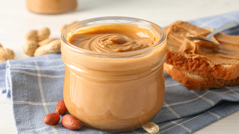 Glass jar of peanut butter