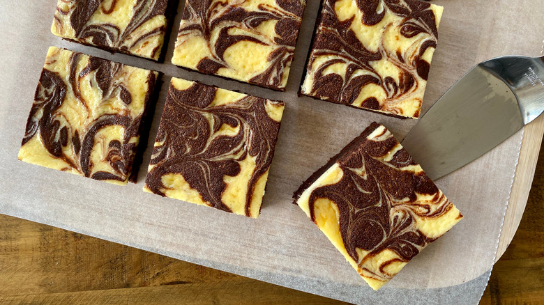 Cream cheese brownies on paper