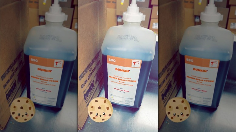 Plastic container of Dunkin' brown cookie syrup