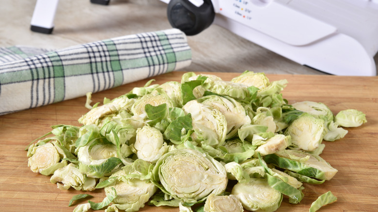 shredded Brussels sprouts near Mandolin slicer