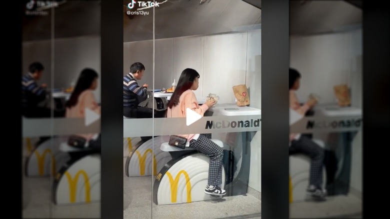 Person riding exercise bike at McDonald's