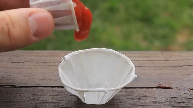 Expanded ketchup cup