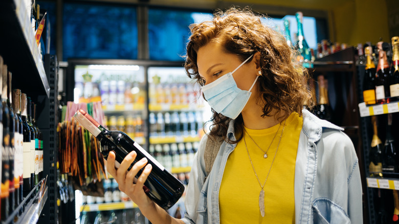 woman shopping for wine