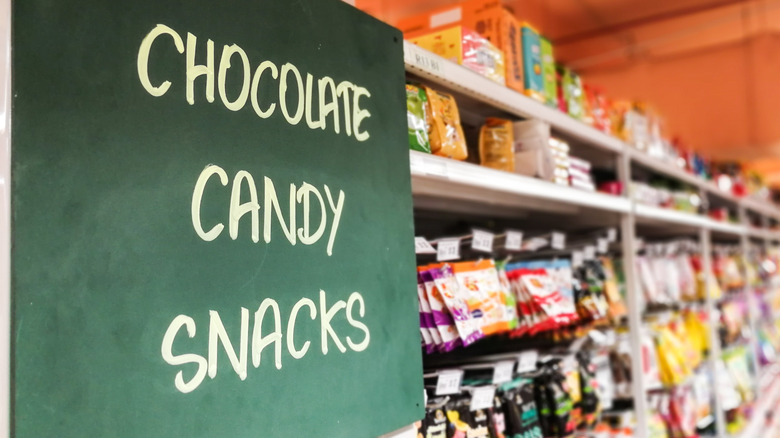 chocolate candy snacks aisle in grocery store