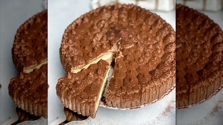 Tiramisu cheesecake with slice removed