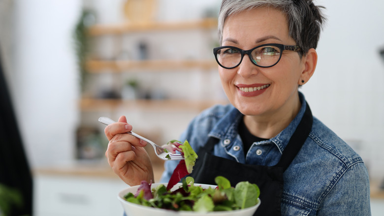 woman eating a salad