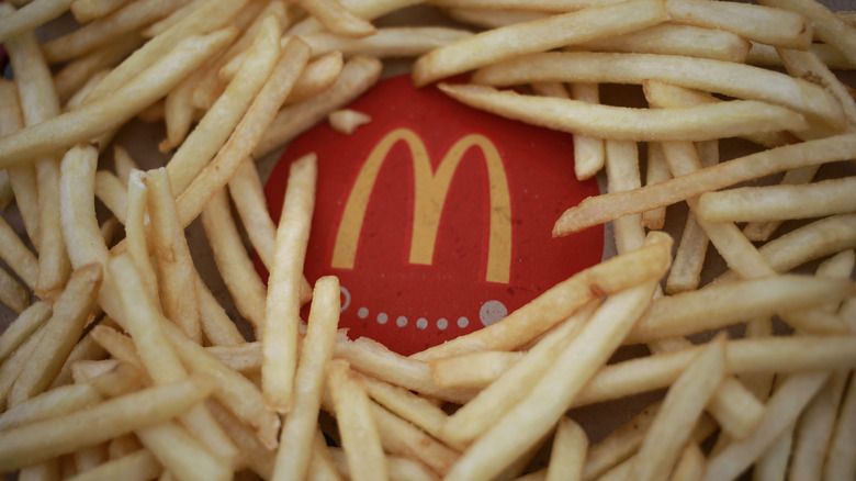 McDonald's logo buried under fries