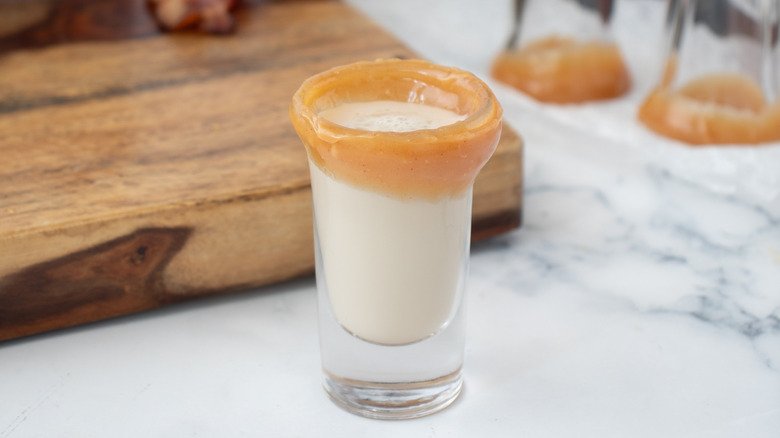 cream drink in caramel-rimmed glass