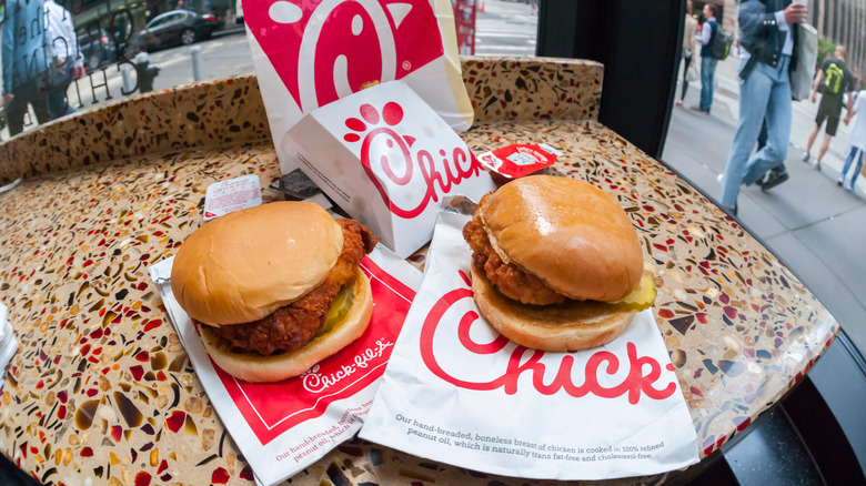 Two Chick-fil-A chicken sandwiches on counter