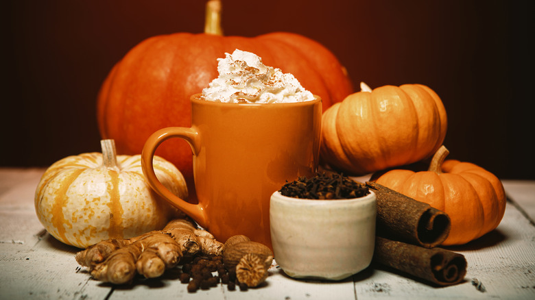 pumpkin spice coffee with pumpkins