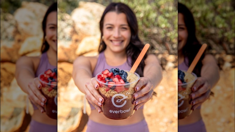 woman holding everbowl acai