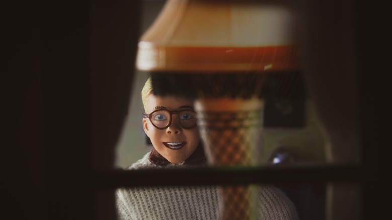 A Christmas Story's Ralphie Parker looking at the Fragile lamp