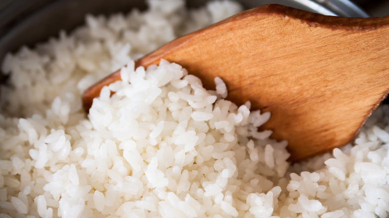 wooden utensil in rice