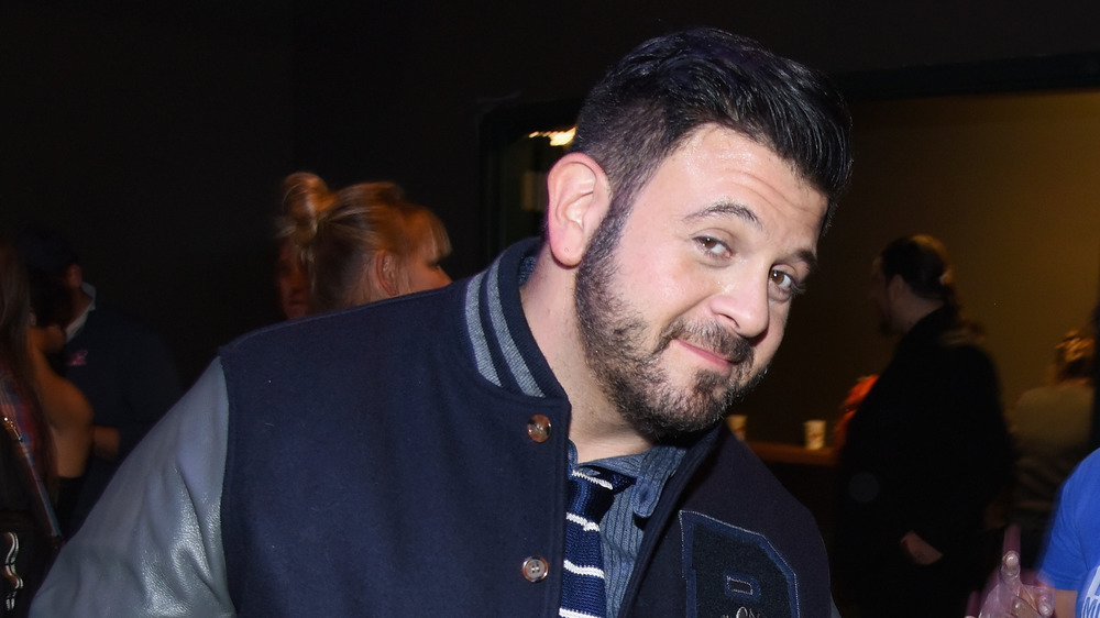 Adam Richman posing for photo